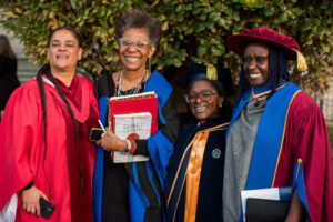 Katherine McKittrick, NourbeSe Philip, Kristin Moriah and Juliane Bitek in academic regalia.